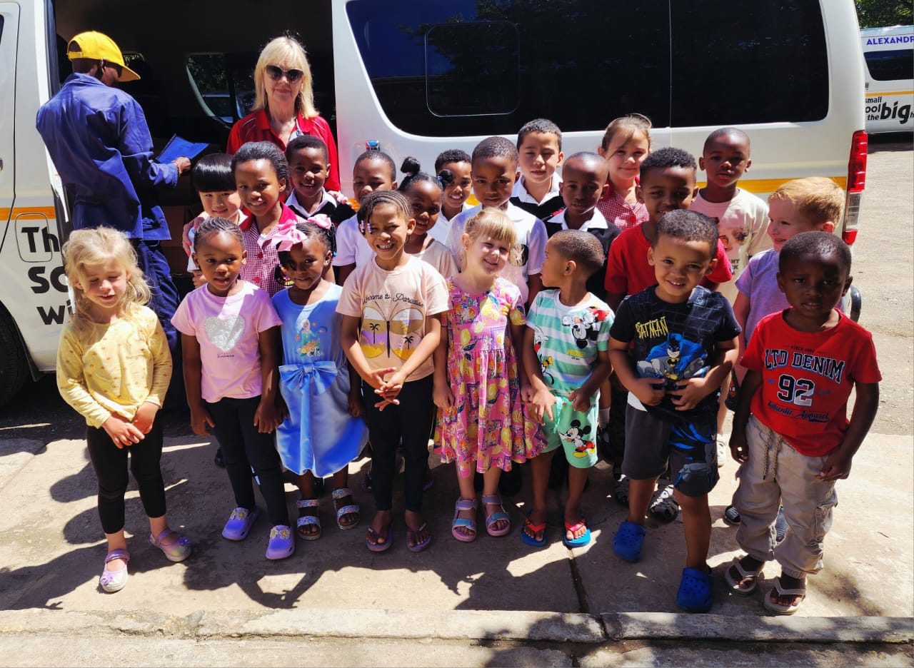 The Preschool and Grade R classes, with their teacher Mrs. Bernie Lategan, on their way to the soup kitchen.