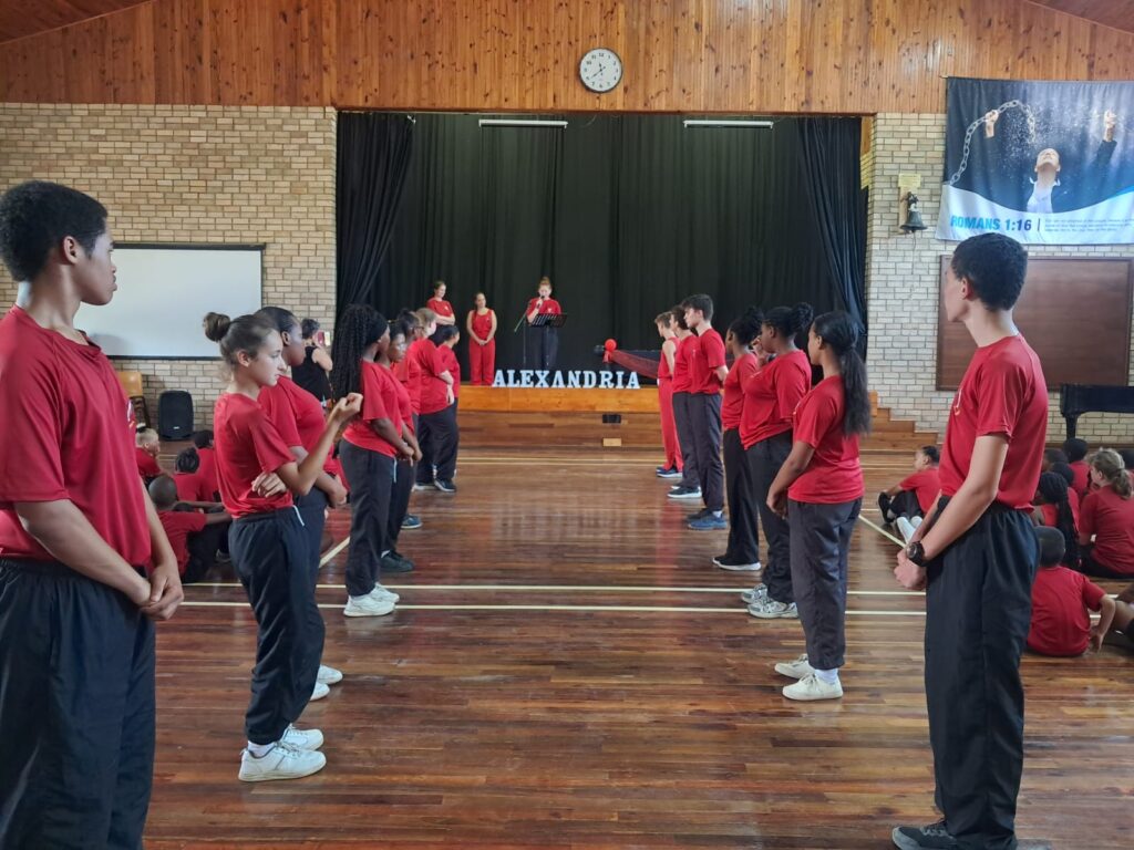 Grade 8 to 11 learners honour the matriculants with a guard of honour during the invitation ceremony.