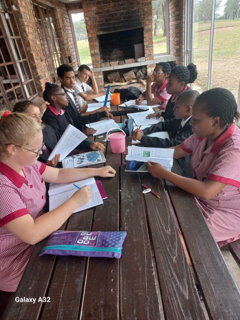 The Grade 8s documenting their findings.