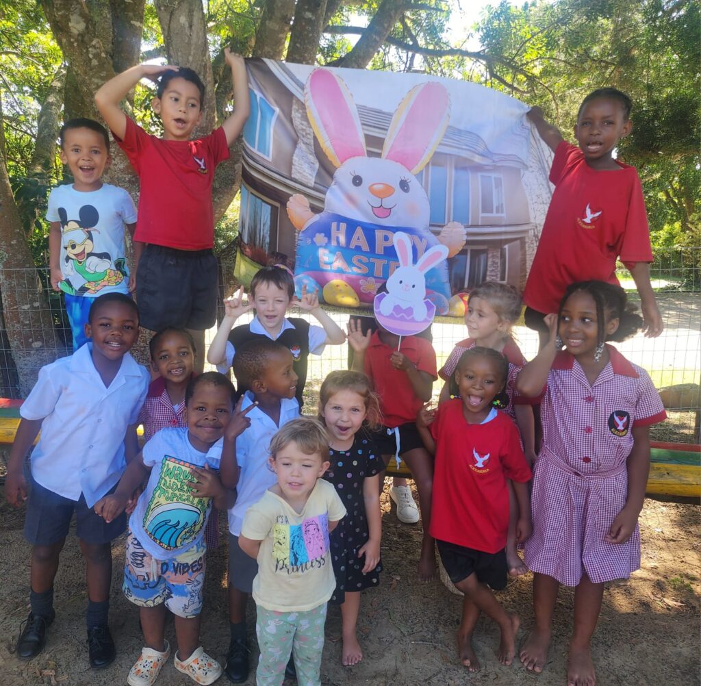 Preschool and Grade R learners joining in the Easter egg hunt fun.