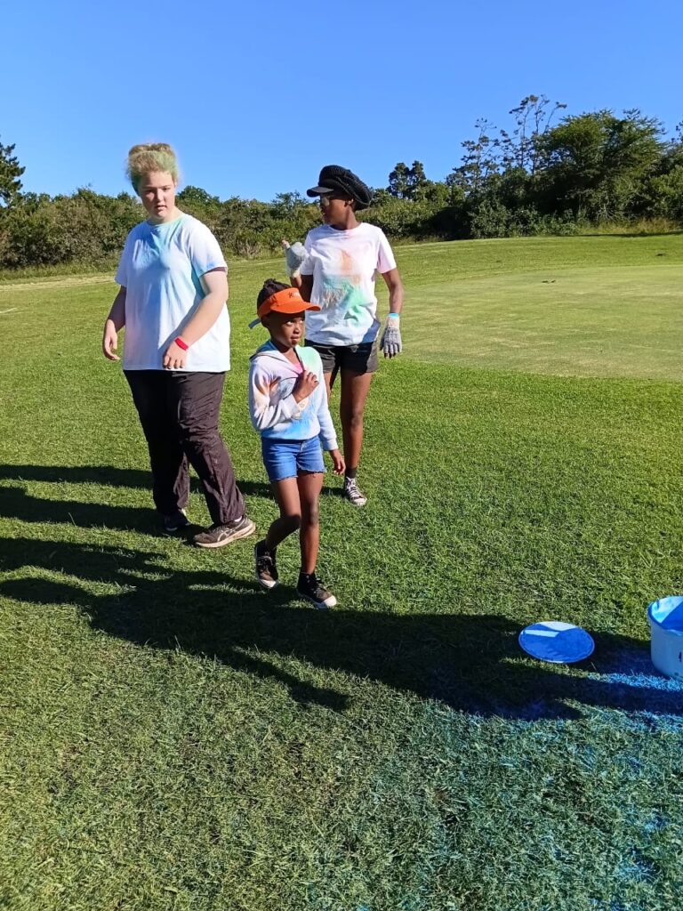 Bianca Potgieter, Alive, and Solima Simqgqoto enjoying the exciting community Colour Run.