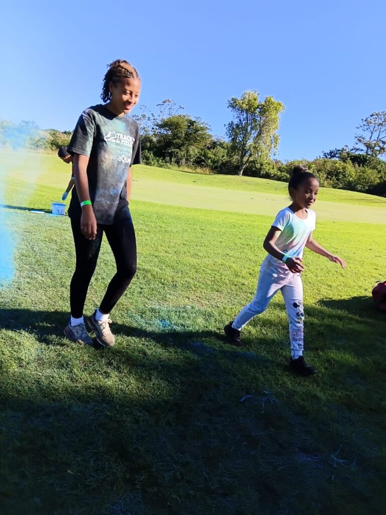Enlin Wentzel and Miley Canon enjoying the Colour Run festivities.