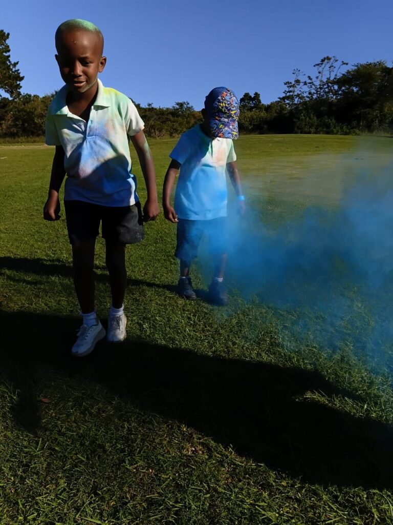 Bukho Mabuza participating enthusiastically in the Colour Run.