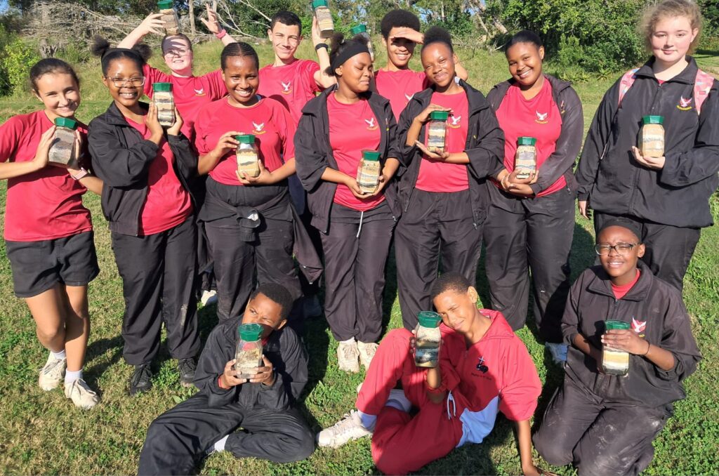 The completed colourful soil profile projects created by the Grade 7–9 learners.