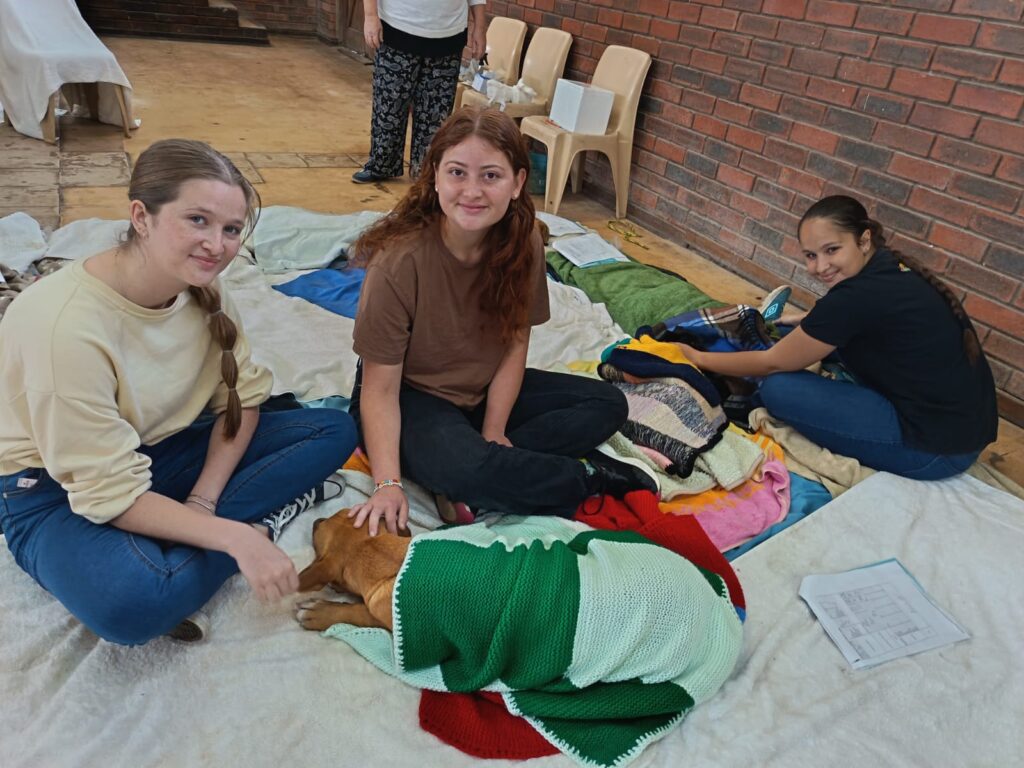 Anke Bosman, Madri Adams and Mia Schutte doing their part to give back to the community.