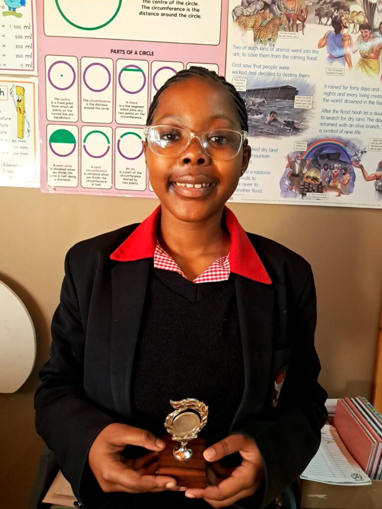 Olwenene Penze is the Student of the Month for August in Grades 7–9.