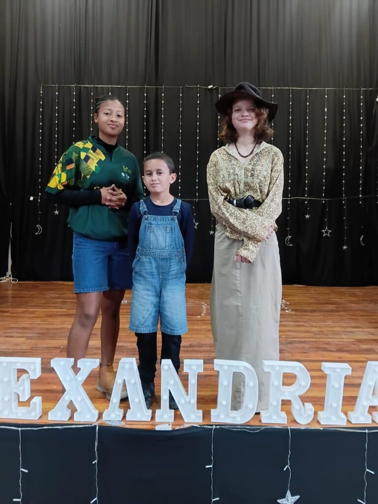 Enlin Wentzel, Ernst Schutte and Ane Opperman proudly celebrating their South African heritage.
