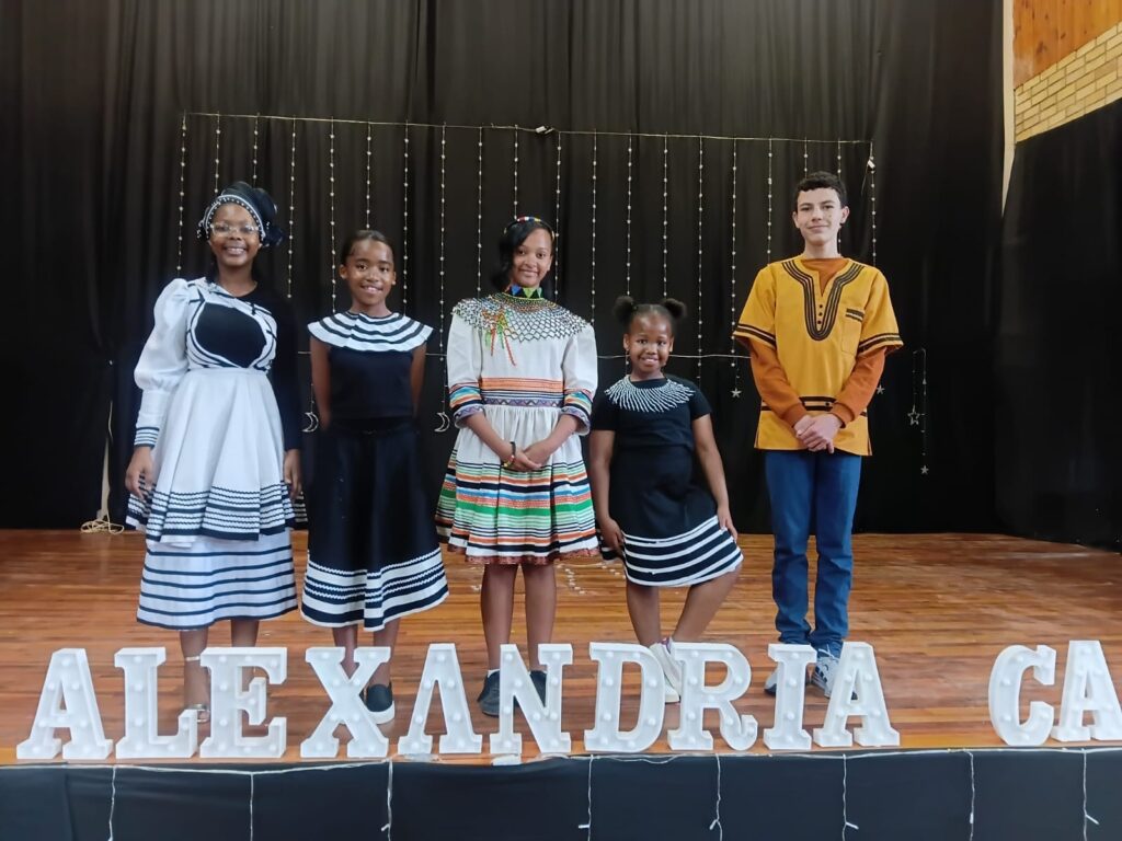 Olwenene Penze, Lingomso Windvoel, Kate-Lynn Cannon, Lubanzi Kelemana and Michiano Coltman proudly dressed in traditional Xhosa attire.