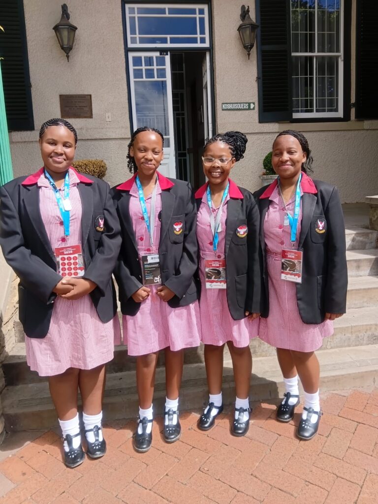 Enzokuhle Maqwili, Luthimna Speelman, Olwenene Penze and Emihle Harmans celebrate their fourth-place finish in the vocal quartet category.